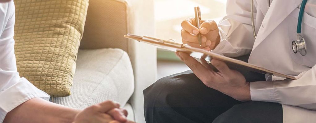 Doctor talking to patient