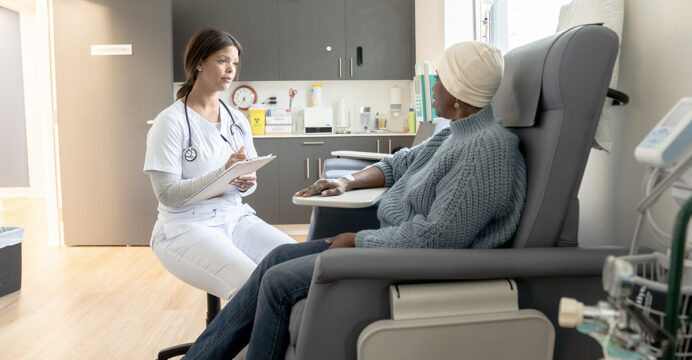 patient and doctor discuss mesothelioma treatment