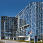 A photo of Baylor College of Medicine's Lung Institute, which is a large building with many windows