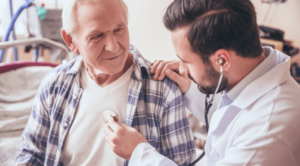 Doctor checking a veteran's breathing with a stethoscope