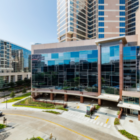 Outer facade of the MD Anderson Cancer Center. The building is many stories high.